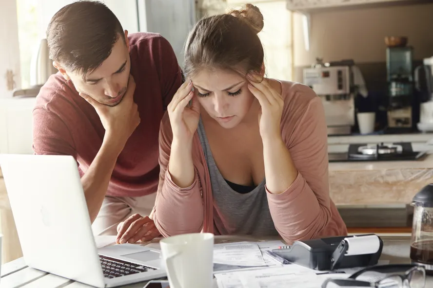 young-family-with-many-debts-facing-financial-stress